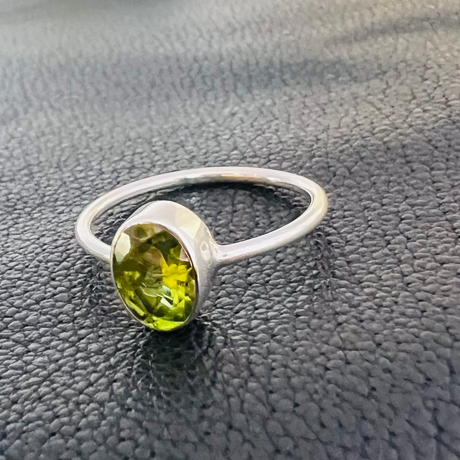 No ordinary love peridot oval brilliant cut