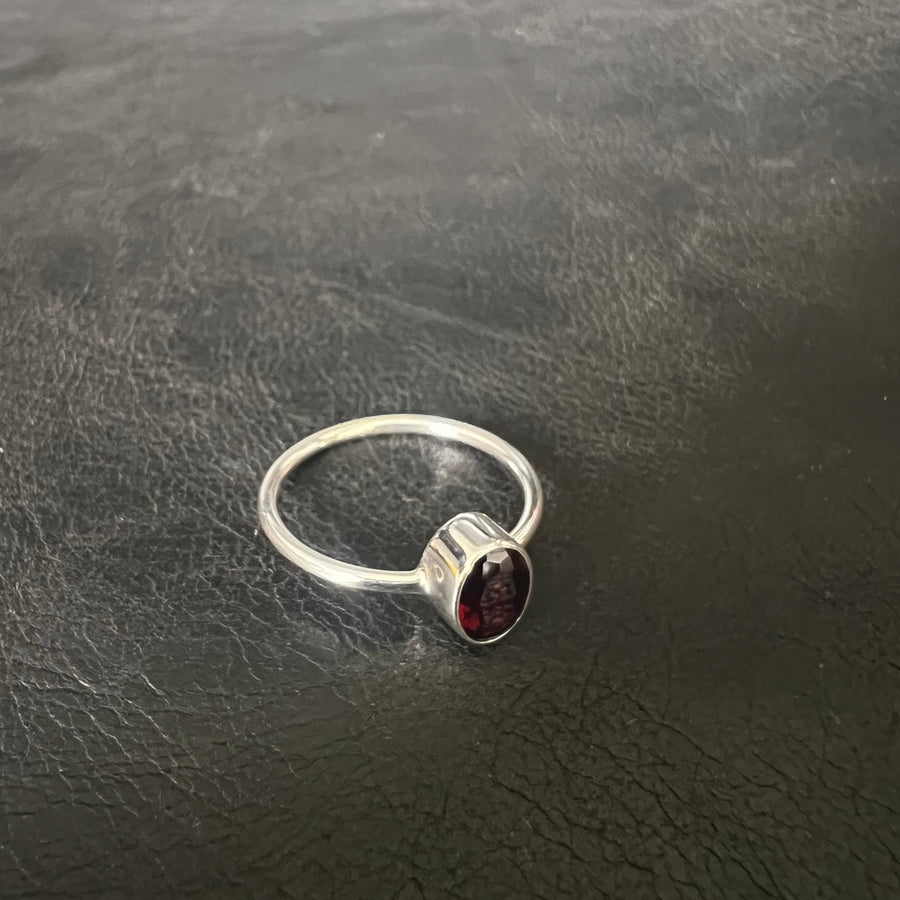 No ordinary love garnet oval brilliant cut