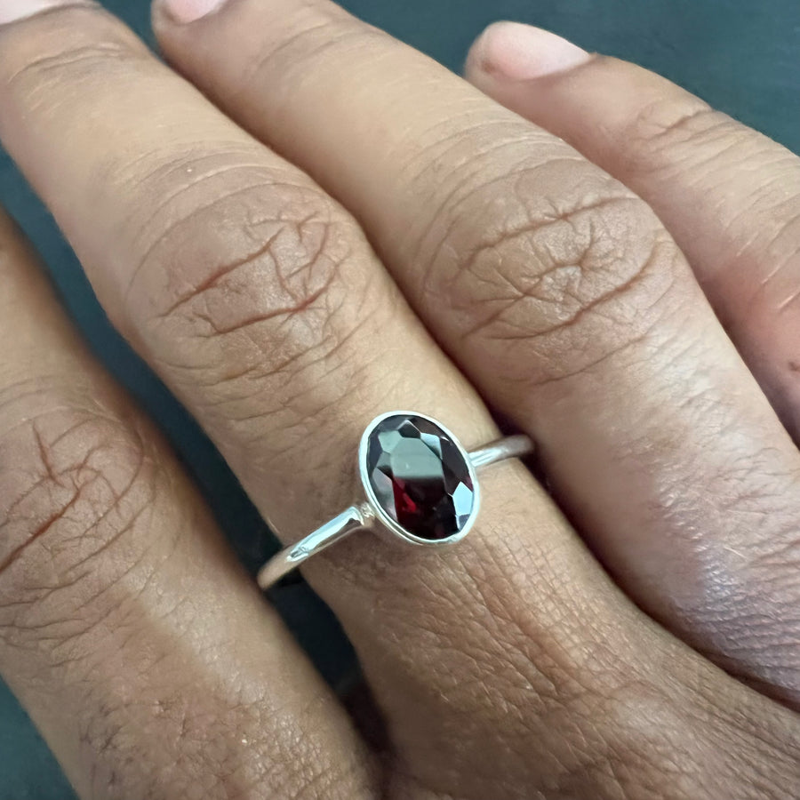 No ordinary love garnet oval brilliant cut